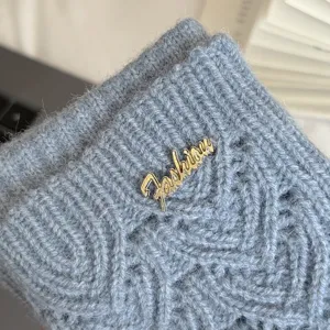 Detailed view of women winter thermal knit gloves touchscreen hollow design blue