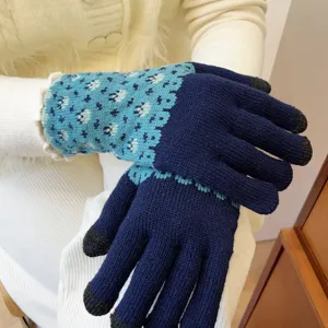 Women winter warm knitted touch screen gloves with stylish blue patterned cuff design.