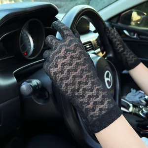 Women black floral lace gloves for summer driving sun protection and outdoor elegant wear.