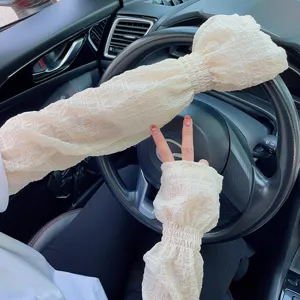Womens long sun protection sleeves in car driving scene, airy bubble texture chic style.