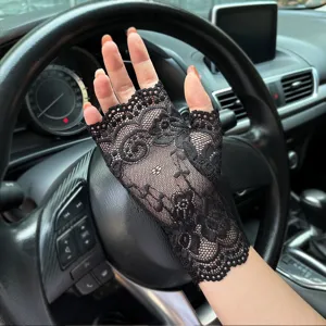 Close-up of black lace fingerless gloves, featuring delicate floral patterns for summer style.