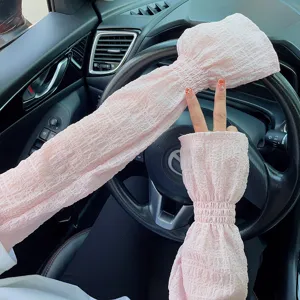 Stylish pink sun protection sleeves for women, cute bubble lantern cuffs for outdoor driving.