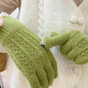 Guanti invernali caldi in maglia touchscreen da donna, design cavo con fodera in pile.