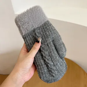 Cozy gray knitted mittens for women with plush faux fur cuff, thick winter warm gloves.
