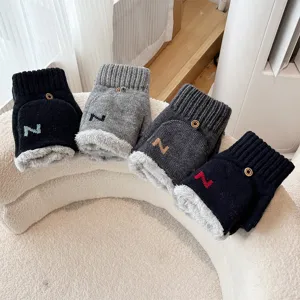 Detailed view of winter knitted convertible half-finger fleece-lined gloves with button.