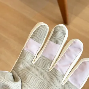 Detail view of winter outdoor windproof cycling touch screen gloves with anti-slip grip.