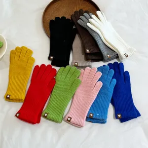 Multi-color women knit gloves detail view, winter warm full finger gloves with cute tag.