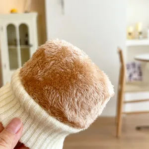 Close-up of winter thermal plush fleece knit gloves detail, cozy and warm for cold weather.