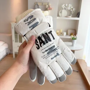 Detailed view of thick winter ski gloves with letter print, windproof and thermal design.