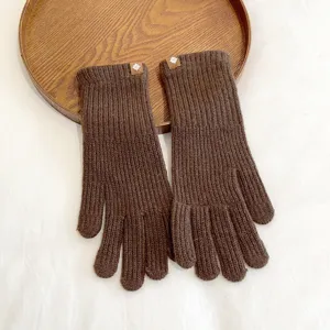 Women's autumn and winter solid color knitted warm gloves, thick and cozy full finger cold-weather gear.