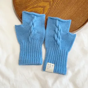 Korean style solid blue knitted fingerless gloves for women, warm winter cable knit design.