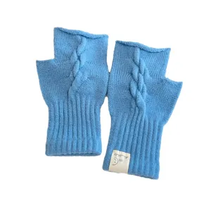Light blue cable knit fingerless gloves for women, stylish winter warm hand warmers.