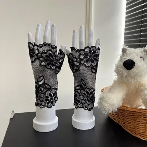 Black lace fingerless gloves, breathable summer dance performance accessories detail view.