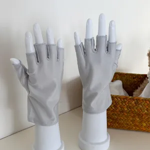 Grey half finger sun protection gloves for women, breathable spandex short gloves.