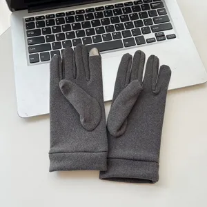 Detailed view of dark grey thermal touchscreen gloves, cozy winter wear for daily outdoor use.