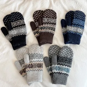 Thickened double-layer knitted winter mittens with classic Nordic snowflake pattern for couples.
