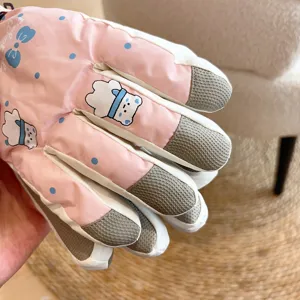 Cute fleece-lined windproof ski gloves detail view, non-slip fingertips for outdoor sports.