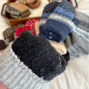 Thickened fleece-lined winter knit mittens with cozy plush interior for couples warmth.