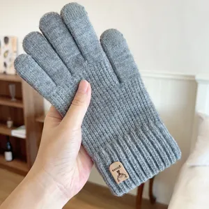 Men's winter warm knitted touchscreen gloves in solid gray with deer logo patch for outdoors.