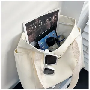 Weisse Canvas Tote Bag Detail, grosse Schultertasche fuer Pendler, Schule, Alltagseinsatz.