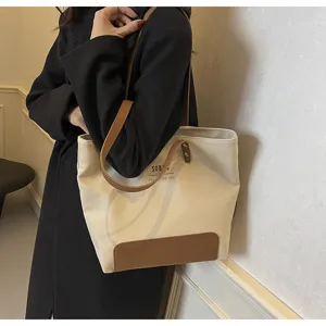 Canvas tote bag for women large capacity shoulder bag casual handbag with contrast PU details.