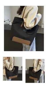 Spacious canvas tote bag for women, stylish shoulder bag with PU leather accent for daily use.