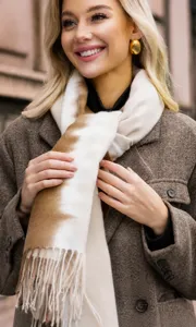 Close-up detail of the gradient cashmere imitation scarf with stylish fringe and warm fabric.