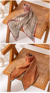 Vista dettagliata foulard triangolare in seta lana con linee geometriche e bordi.