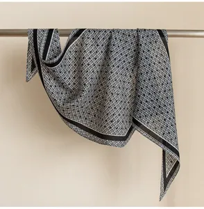 Classic black and white patterned long scarf, elegant lightweight design for women's daily wear.