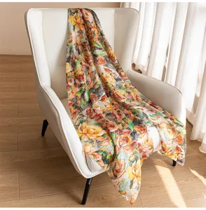 Floral printed silk scarf for women, elegant design, versatile seasonal accessory, soft fabric.