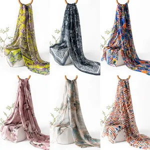 Elegant silk scarf collection featuring vibrant floral and abstract prints for women.