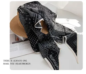 Luxury mulberry silk scarf with paisley pattern, elegant women wrap for stylish sun protection.