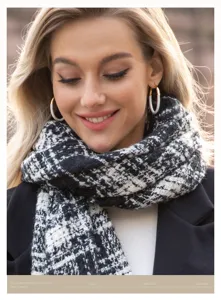 Classic black and white plaid scarf detail shot, cozy autumn winter warm women accessory.