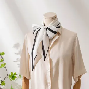 Elegant mulberry silk women's scarf with chic black and white striped border tied neatly.