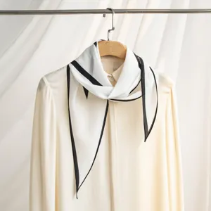 Elegant silk scarf for women, classic black and white border design, versatile commute accessory.