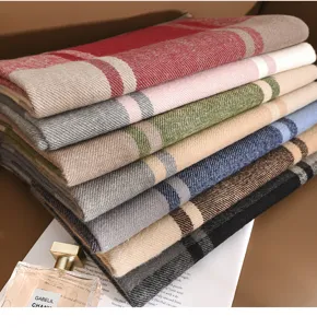 Cozy imitation cashmere plaid scarf in multiple chic colors, warm autumn and winter fashion accessory.