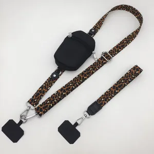 Leopard print mobile phone cross body lanyard with zipper pouch and adjustable wide strap.