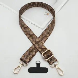 Ethnic style bohemian mobile phone strap with adjustable double hooks and black tether tab.