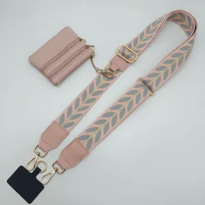 Pink embroidered wide bag strap with detachable coin purse and phone tether accessory.