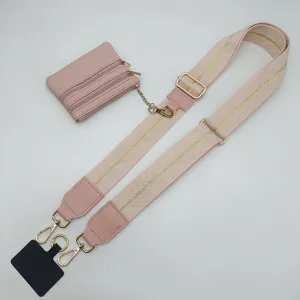 Pink wide embroidered bag strap with coin purse and phone tether accessory for crossbody bags.