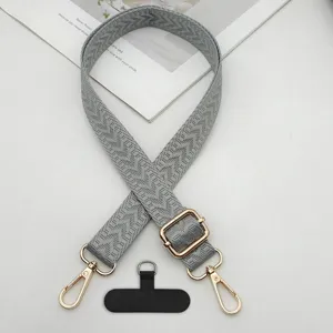Tracolla per telefono intrecciata con lunghezza regolabile, fibbie e patch universale.