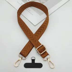 Tracolla per telefono intrecciata con lunghezza regolabile, parti metalliche e patch universale.
