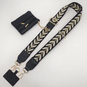 Black wide replacement shoulder strap with leaf embroidery, coin purse and phone tether tab.