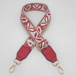 Tracolla per borsa in jacquard colorato da 3,8 cm con estremita in pelle e ganci metallici.