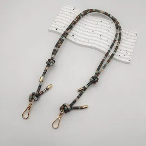 Bohemian style woven replacement bag strap and phone lanyard with gold hardware and clasps.
