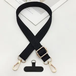 Tracolla per telefono in tessuto nero con fibbia regolabile e linguetta universale.