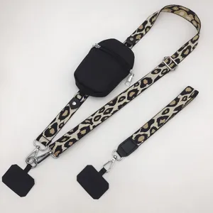 Leopard print mobile phone lanyard strap with zipper pouch adjustable wide shoulder strap detail view.