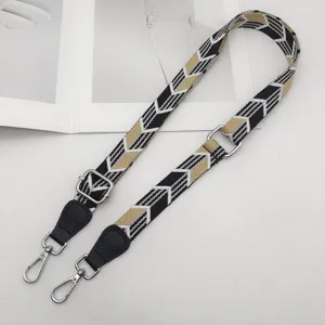Verstelbare 2,5 cm brede vervangende tassenriem met geometrisch patroon en zilverkleurige hardware.