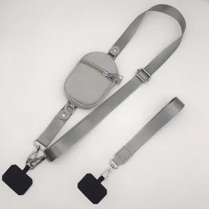 Adjustable nylon crossbody phone lanyard with mini pouch and universal tether tabs for daily use.