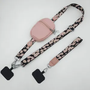 Leopard print crossbody phone strap with zipper pouch, adjustable wide lanyard and tether tabs.
